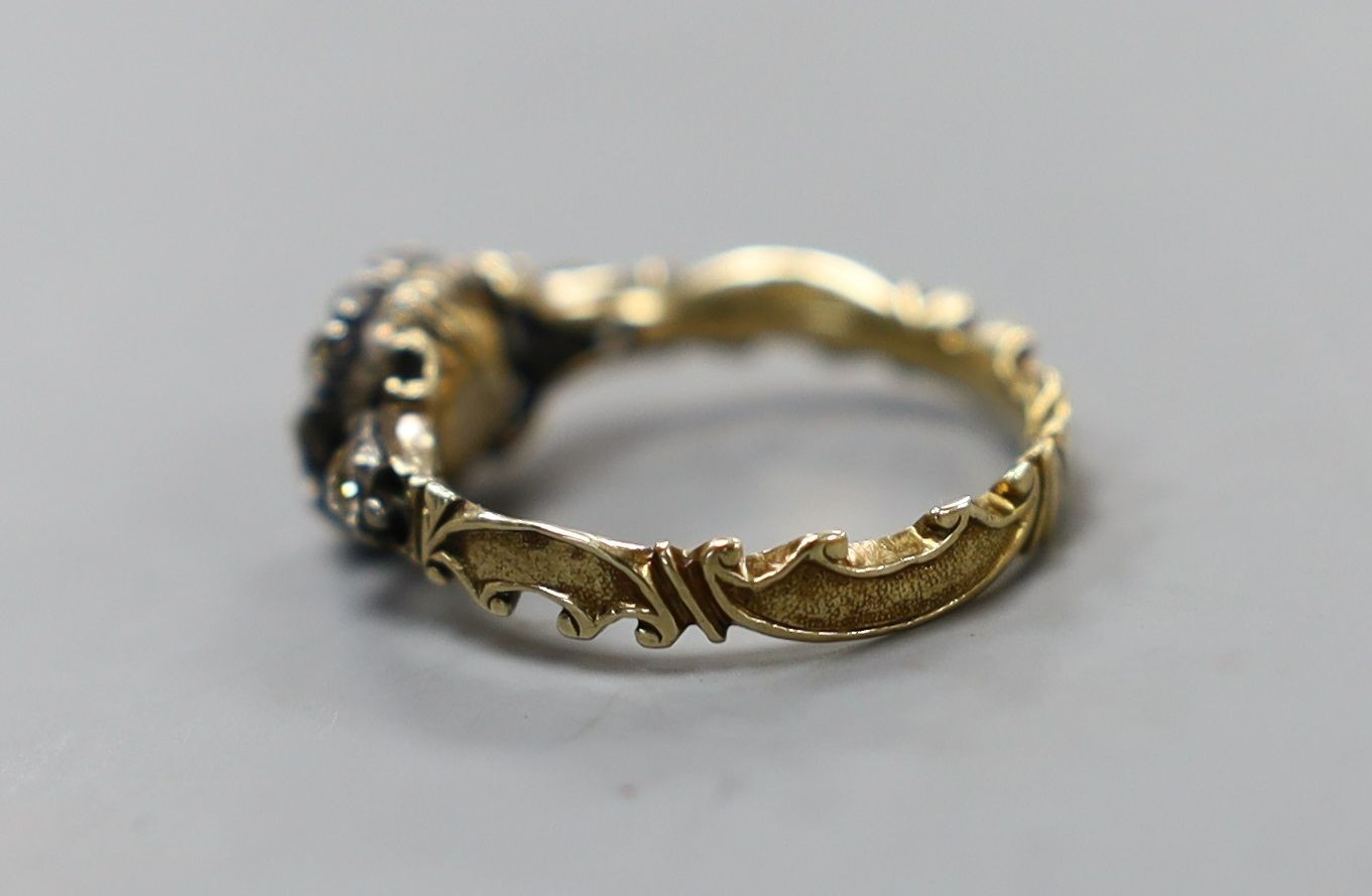 A late 18th century gold and old cut diamond set circular cluster ring